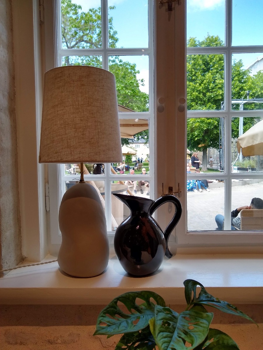 Ferm Living Hebe lamp on a sunny windowsil
