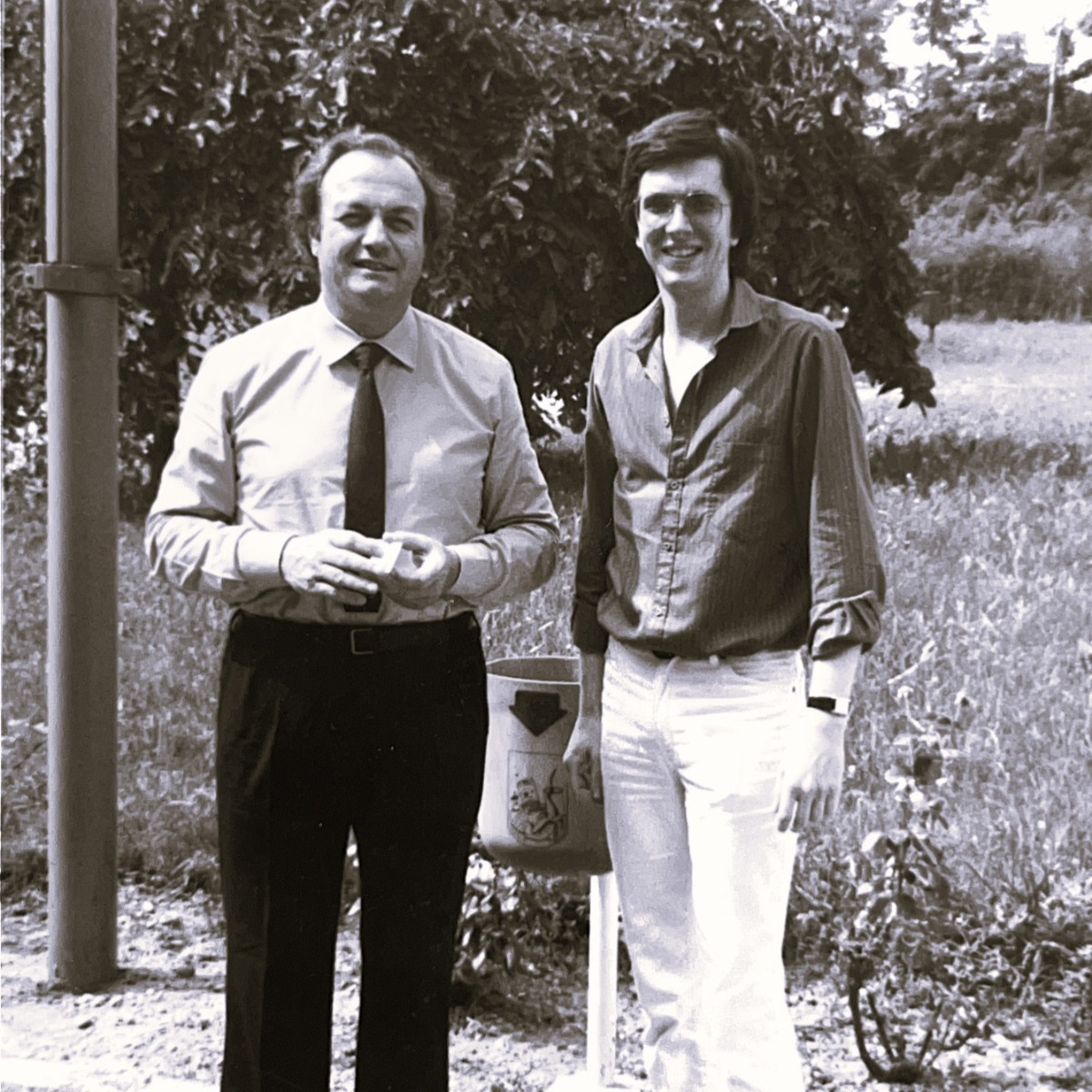 Ernesto Gismondi with David Village in 1987 outside the Artemide factory in Milan, Italy