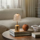 Nuura Asteea LED Portable Lamp on Coffee Table