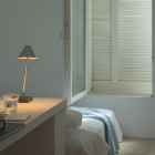 Santa & Cole Gira Mini Portable Lamp in Bedroom