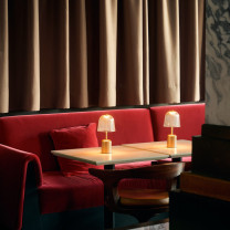 Nuura Asteea LED Portable Lamp in Restaurant