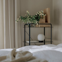 New Works Globe Lantern Table Lamp on shelf