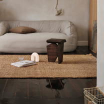 Vuelta LED Portable Lamp beside coffe table