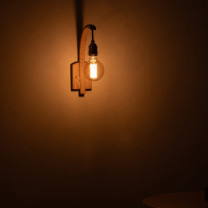 Tom Raffield Hanter Wall Light Illuminated