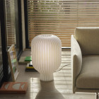 Muuto Stand Table Lamp 59 next to sofa