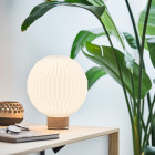 Le Klint 375 Table Lamp Light Oak on Table