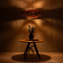 Tom Raffield Gwenen Pendant Above Table Illuminated