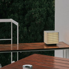 Santa & Cole Shiro Outdoor Table Lamp on Patio Table