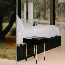 Santa & Cole Gira Mini Portable Lamp at Bedside